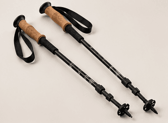 A pair of trekking poles on a clean light background.